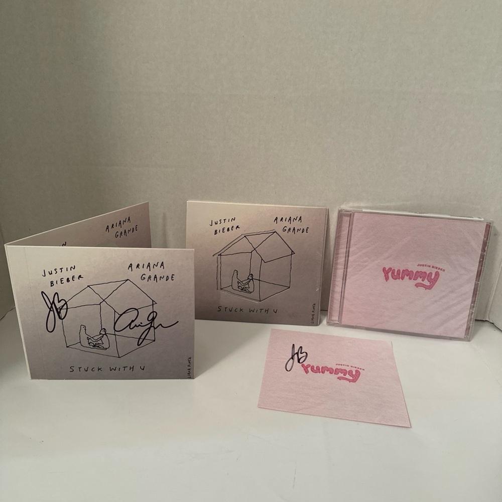 Stuck With U Autographed CD Ariana Grande Justin Bieber & Autographed Yummy CD